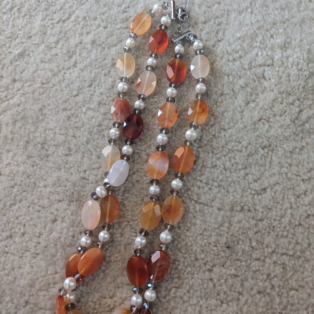 Elegant Orange and White Beaded Necklace
